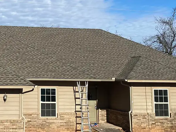 Brown GAF shingles installed on roof